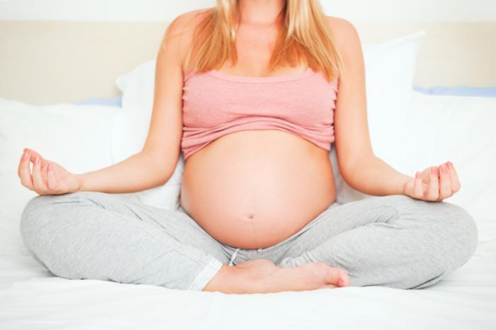 woman taking part in pregnancy yoga