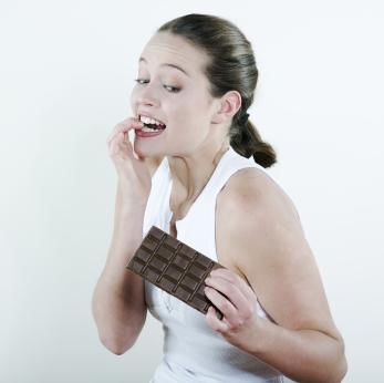 A woman tempted by chocolate