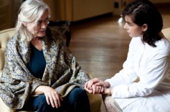 woman with dementia and carer